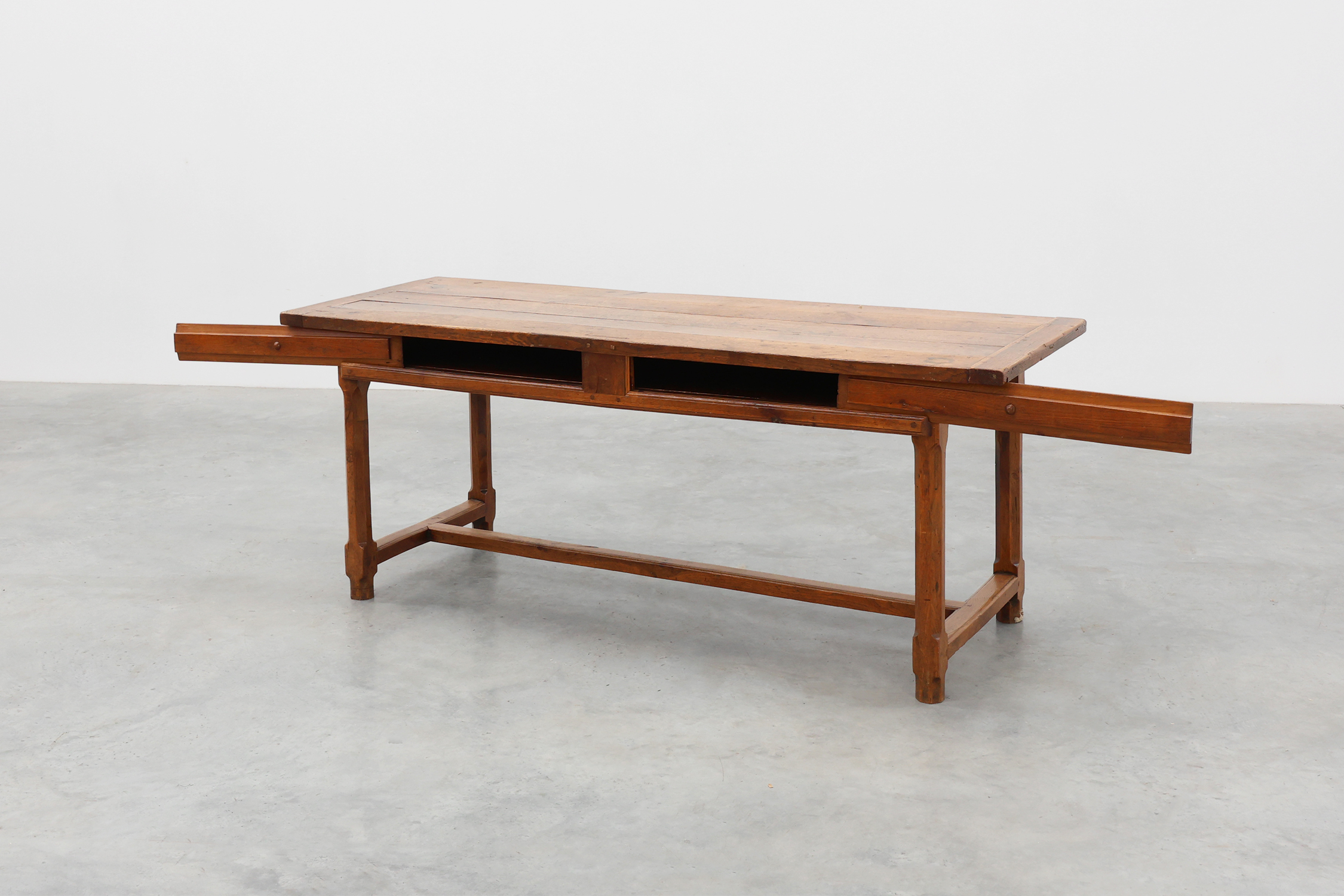 Rustic 19th century oak dinner table with drawers that open laterally, France ca. 1930thumbnail
